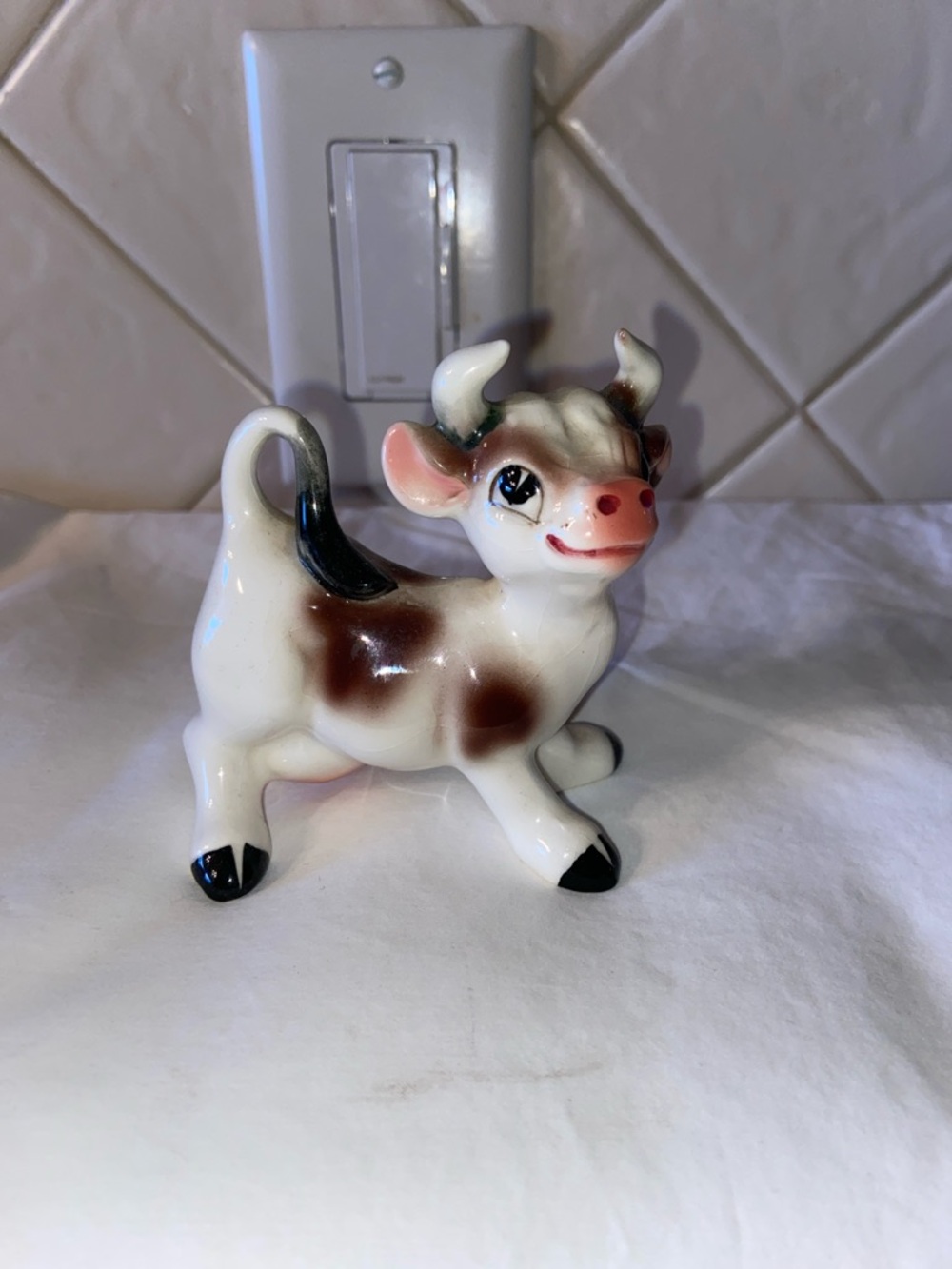 Vintage cow salt or pepper shaker